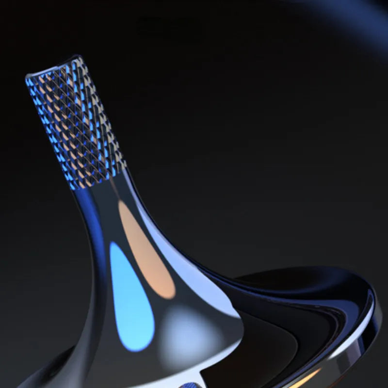 Image from thesciencehut.com: Inception spinning top close up of thumb grip