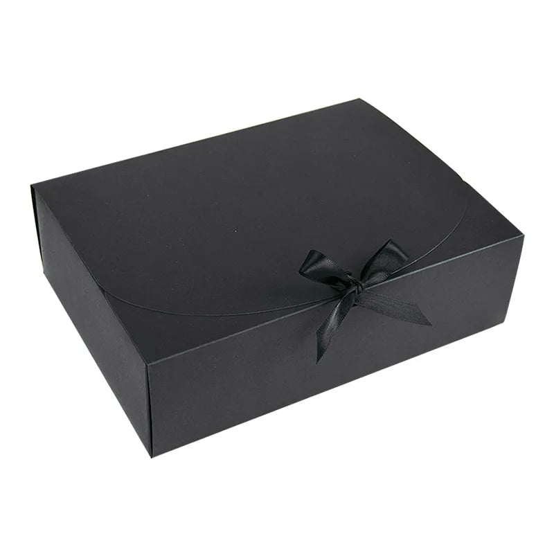 Large Black gift box with a ribbon on a white background