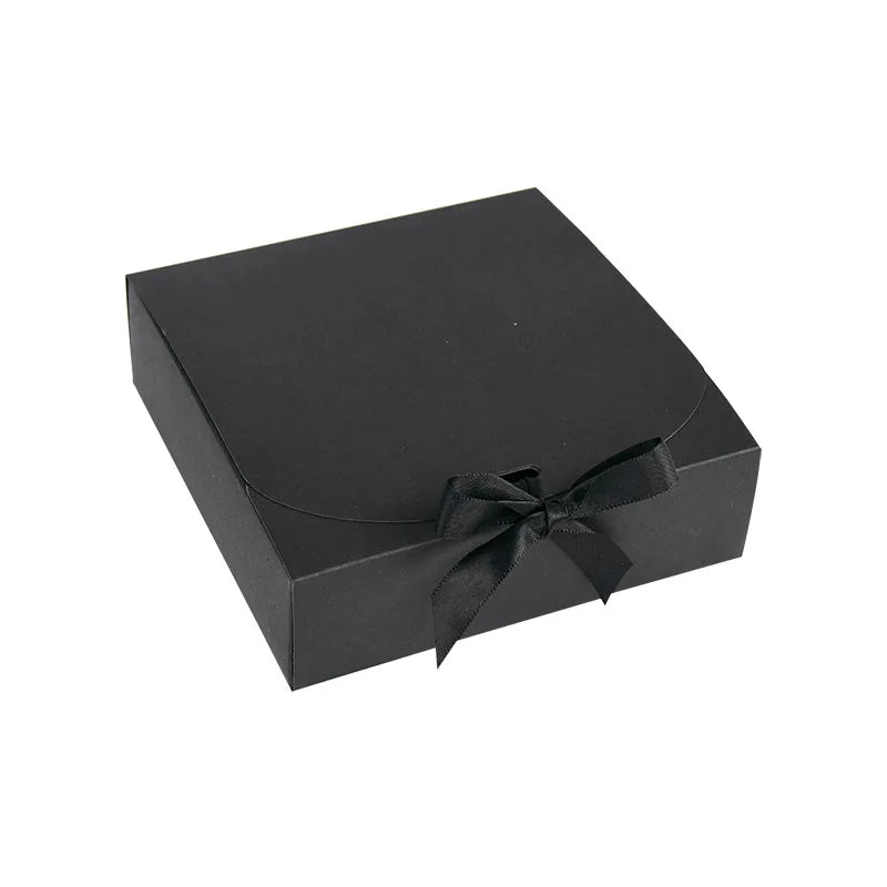 Medium Black gift box with a ribbon on a white background