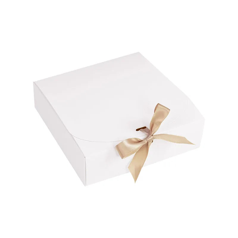 Medium White gift box with a ribbon on a white background