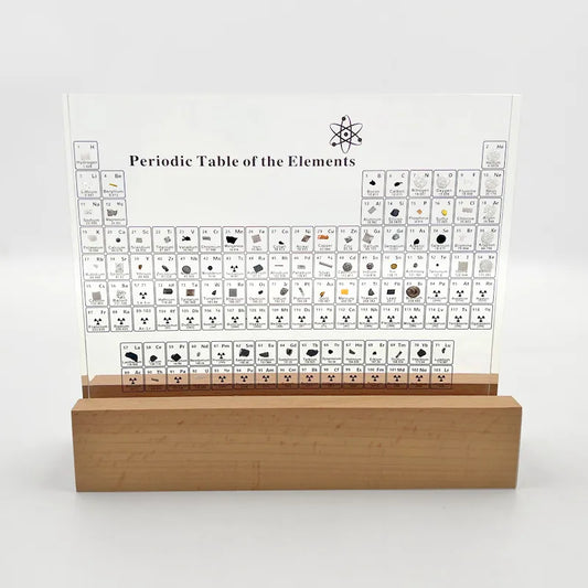Periodic table with real elements on wooden base