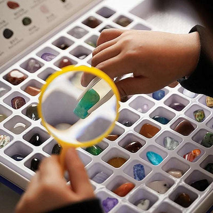 Image from thesciencehut.com: Close up examination of gemstones with magnifying glass