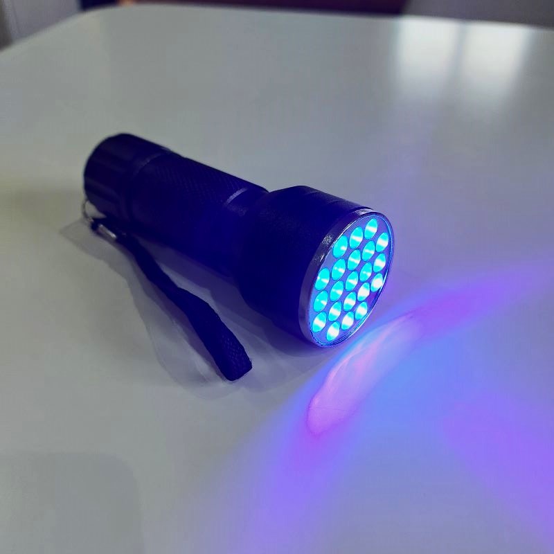 LED UV torch powered on